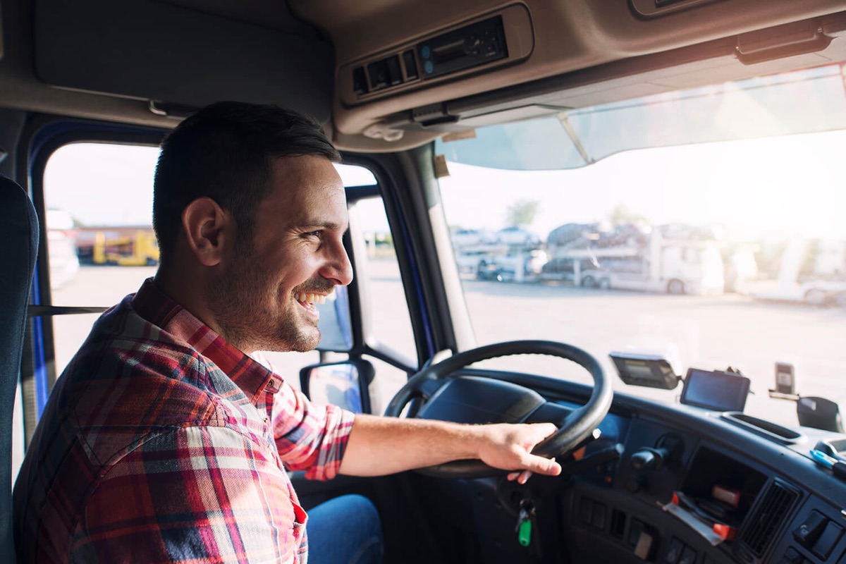 An HGV Learning trainee at the wheel of a lorry